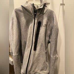 Nike Men’s Large tech jacket.